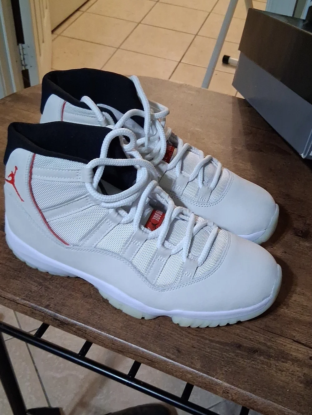 Jordan Men’s High-Top Sneakers in White with Red Accents